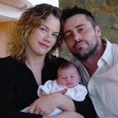 Melissa and Matt holding their daughter